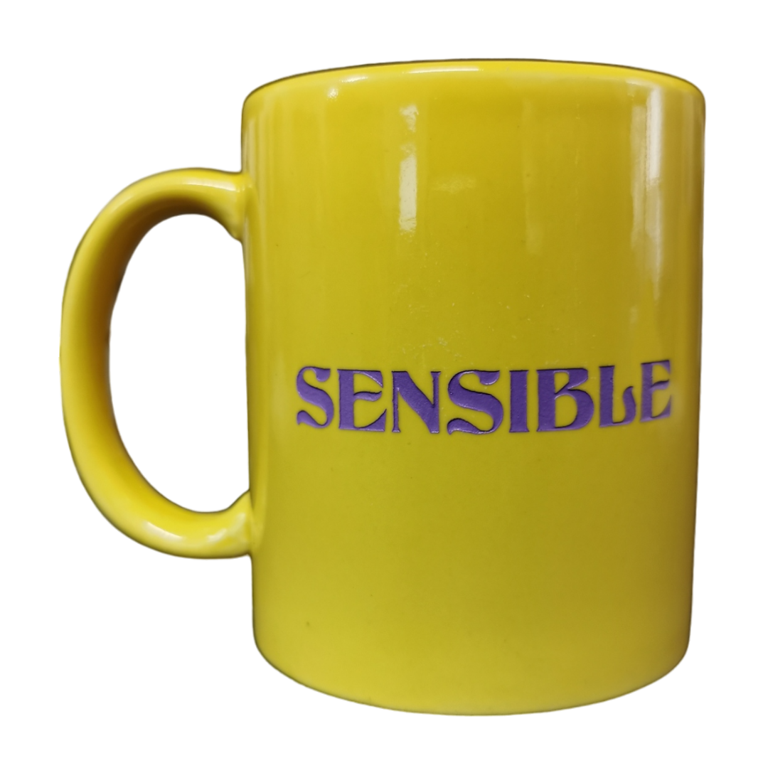 "Sensible, Chingona" Taza Amarilla Letras Moradas