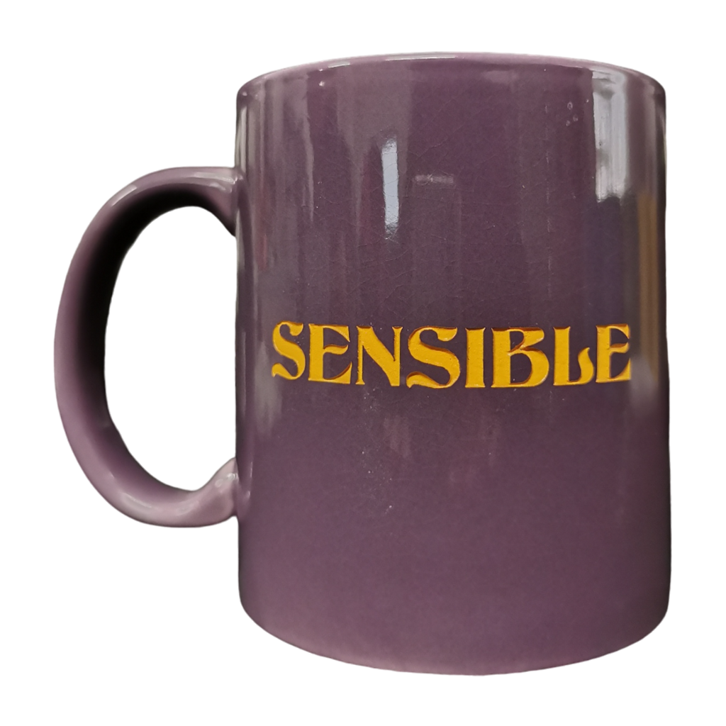 "Sensible, Chingona" Taza Morada Letras Naranjas