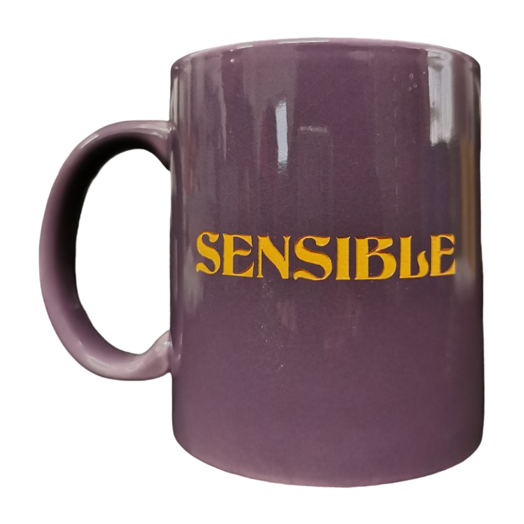 "Sensible, Chingona" Taza Morada Letras Naranjas